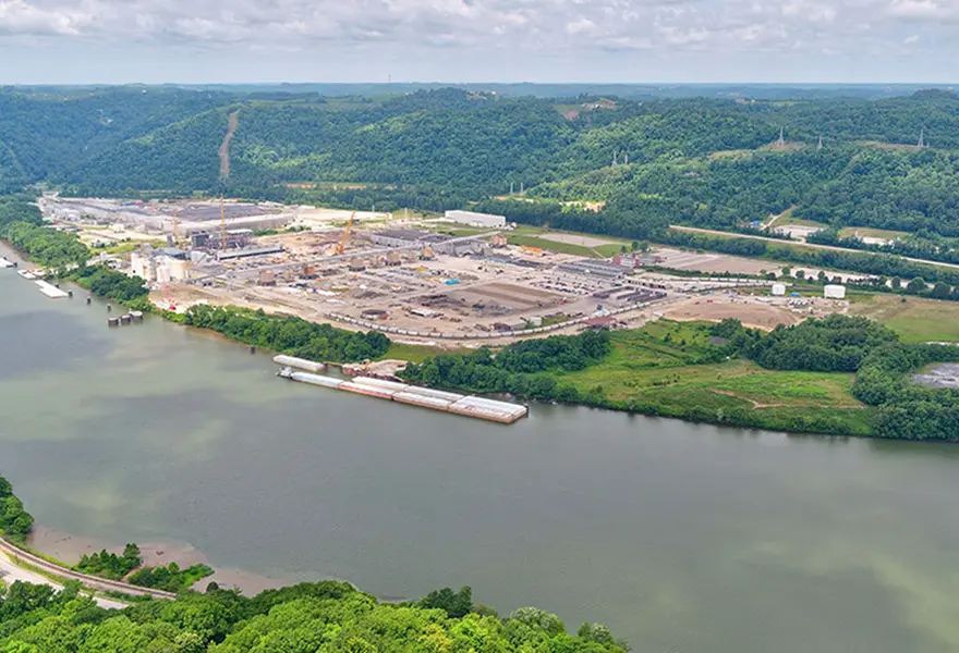 Site overview during power plant construction, looking northeast