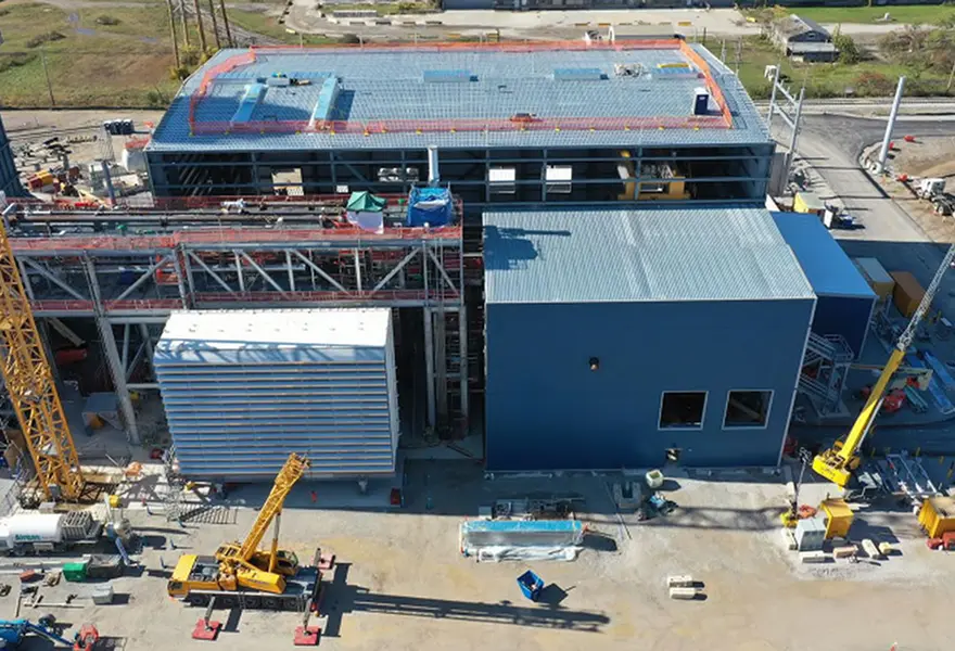 Power plant construction – combustion turbine air inlet, pipe rack, turbine building