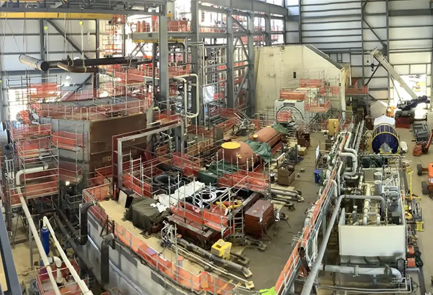 Power plant construction – turbine building interior – condenser, steam turbine, generator, lube oil system